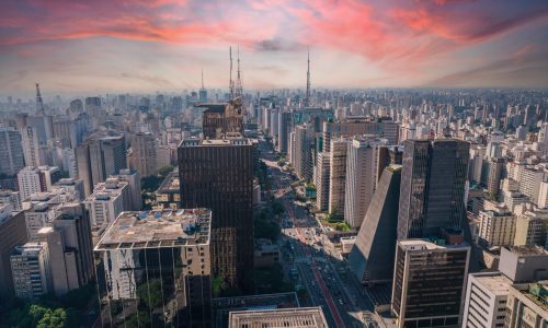 Aerial view of Av. Paulista in São Paulo, SP. Main avenue of the capital. With many radio antennas, commercial and residential buildings. Aerial view of the great city of São Paulo. Sunset