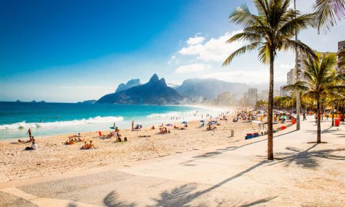 Palms and Two Brothers Mountain on Ipanema beach in Rio de Janeiro. Brazil.